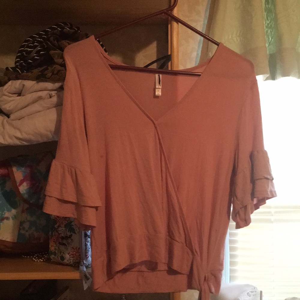 Kinda seer like material but size medium and a low cut front